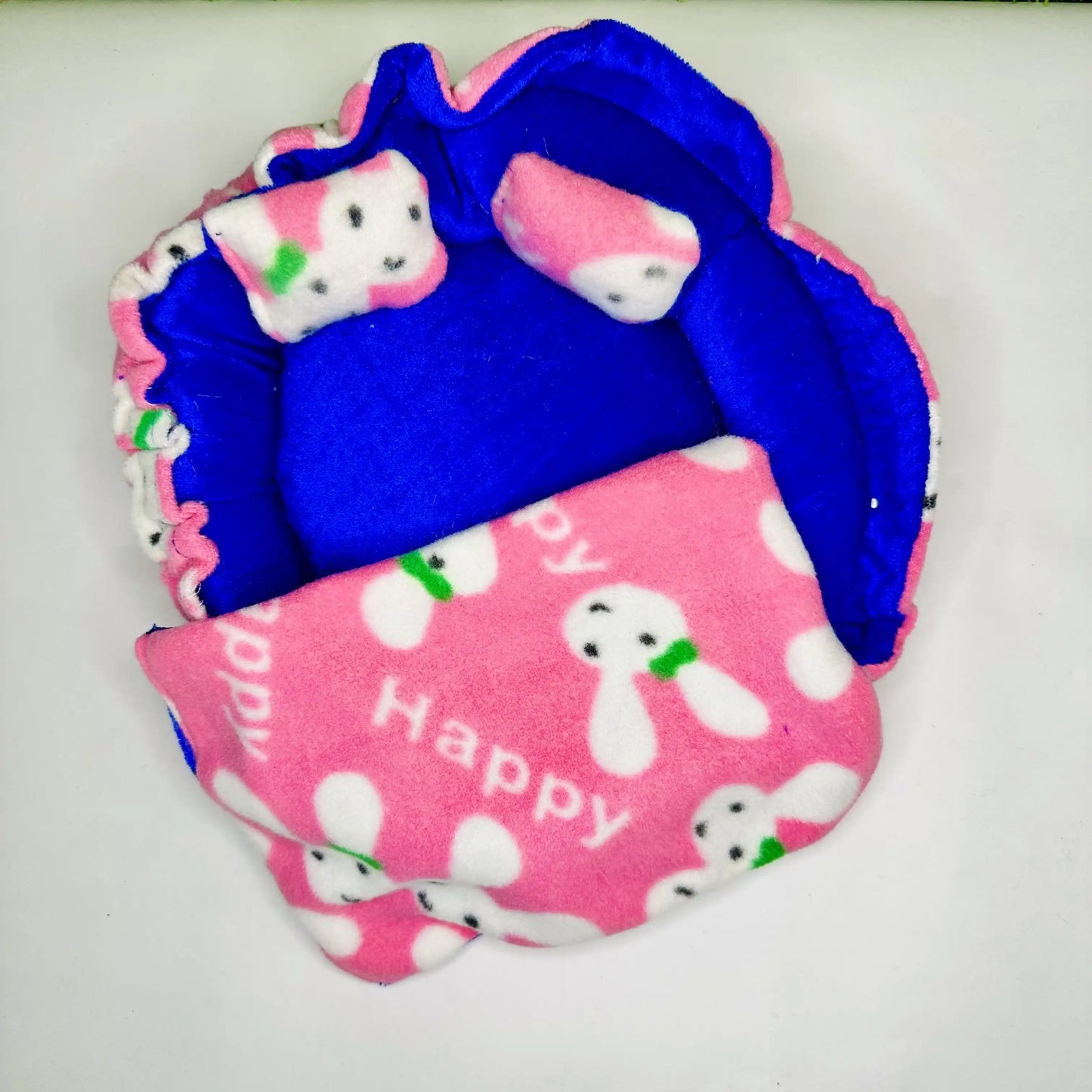 Top view of a cute Bunny Print Laddu Gopal Bedding Set with Pink Fleece Blanket & Pillow.