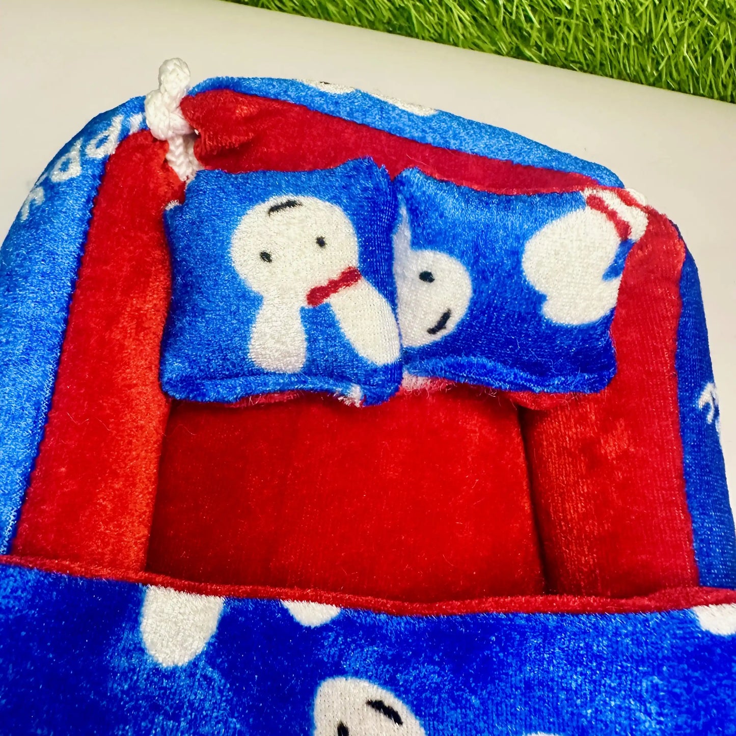 Close up view of a Blue & Red Bunny Print Winter Laddu Gopal ji Bedding Set with Pillow with Blanket.