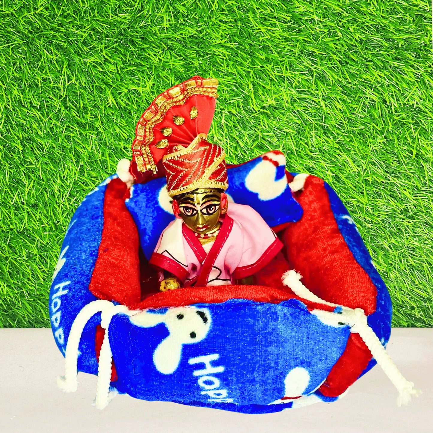 Front view of a Blue & Red Bunny Print Winter Laddu Gopal ji Bedding Set with Pillow with Blanket.