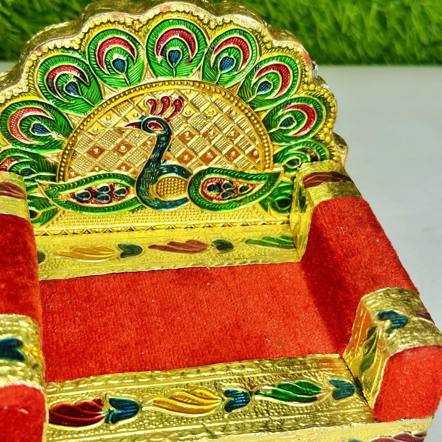 Close view of a Handcrafted Peacock Laddu Gopal Singhasan Decorative Multicolor Velvet Sofa.