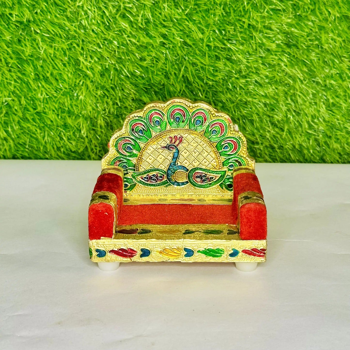Front view of a Handcrafted Peacock Laddu Gopal Singhasan Decorative Multicolor Velvet Sofa.