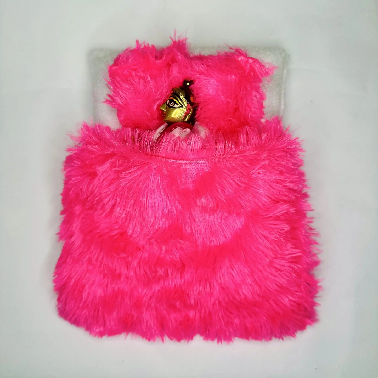 Top View of Laddu ji sleeping in a Luxury Hot Pink Furry Laddu Gopal Bedding Set with Matching Pillow & Blanket