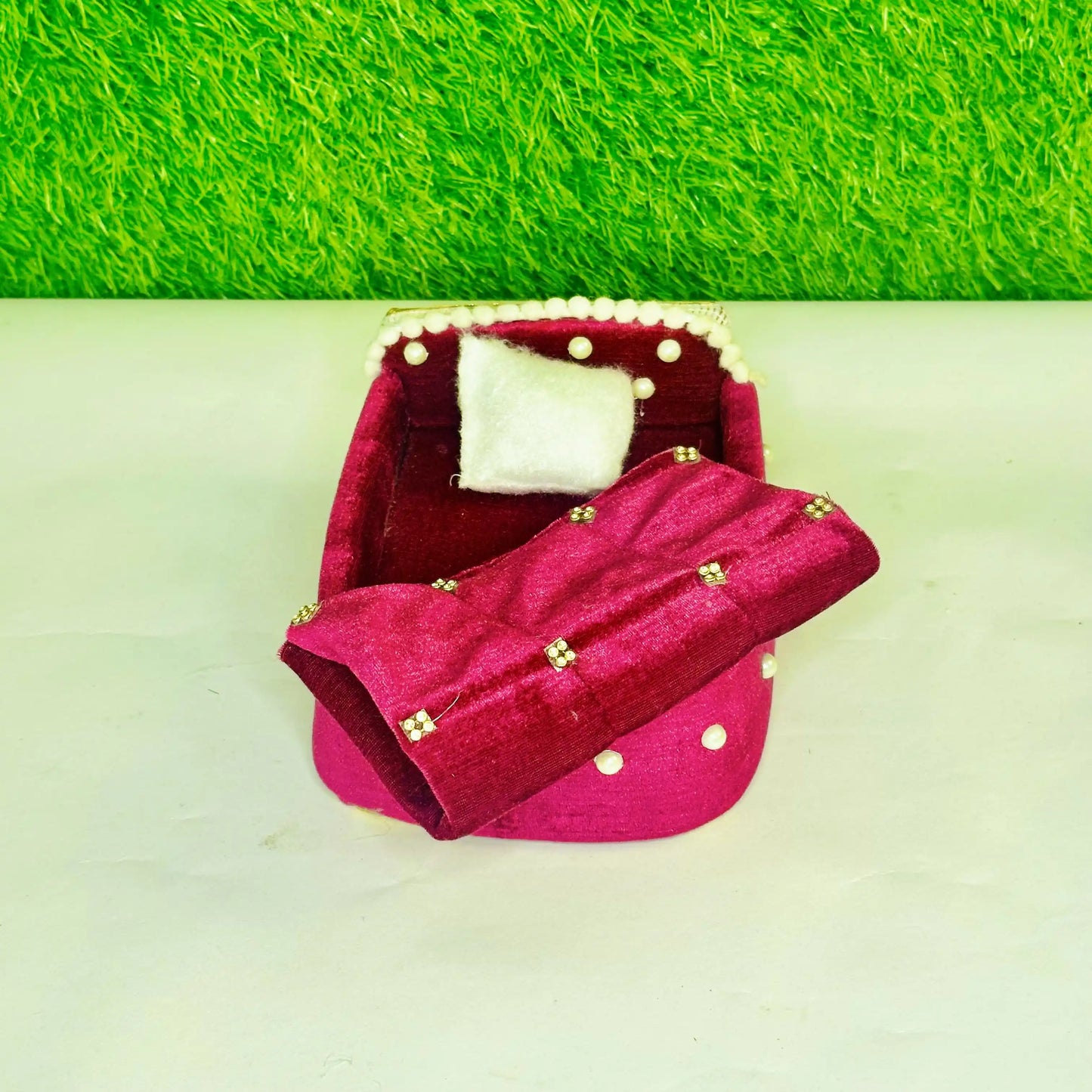 Front view of a Magenta Velvet Laddu Gopal Bedding Set with Pearl Border & Stone Work Blanket.