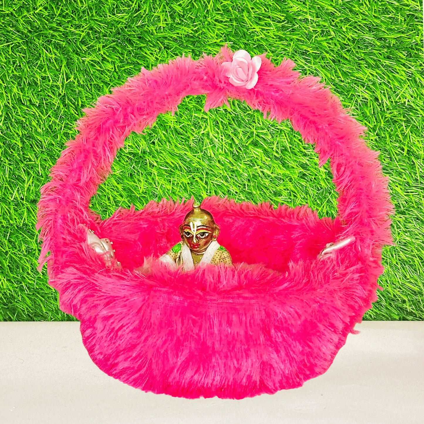 Kanha ji sitting in a Pink Fur Comfirtable Carry Basket for Laddu Gopal Ji.
