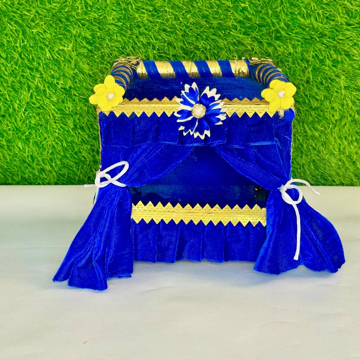 Front view of a Royal Blue Velvet Laddu Gopal Singhasan Jhula, Beautiful Floral Decoration.