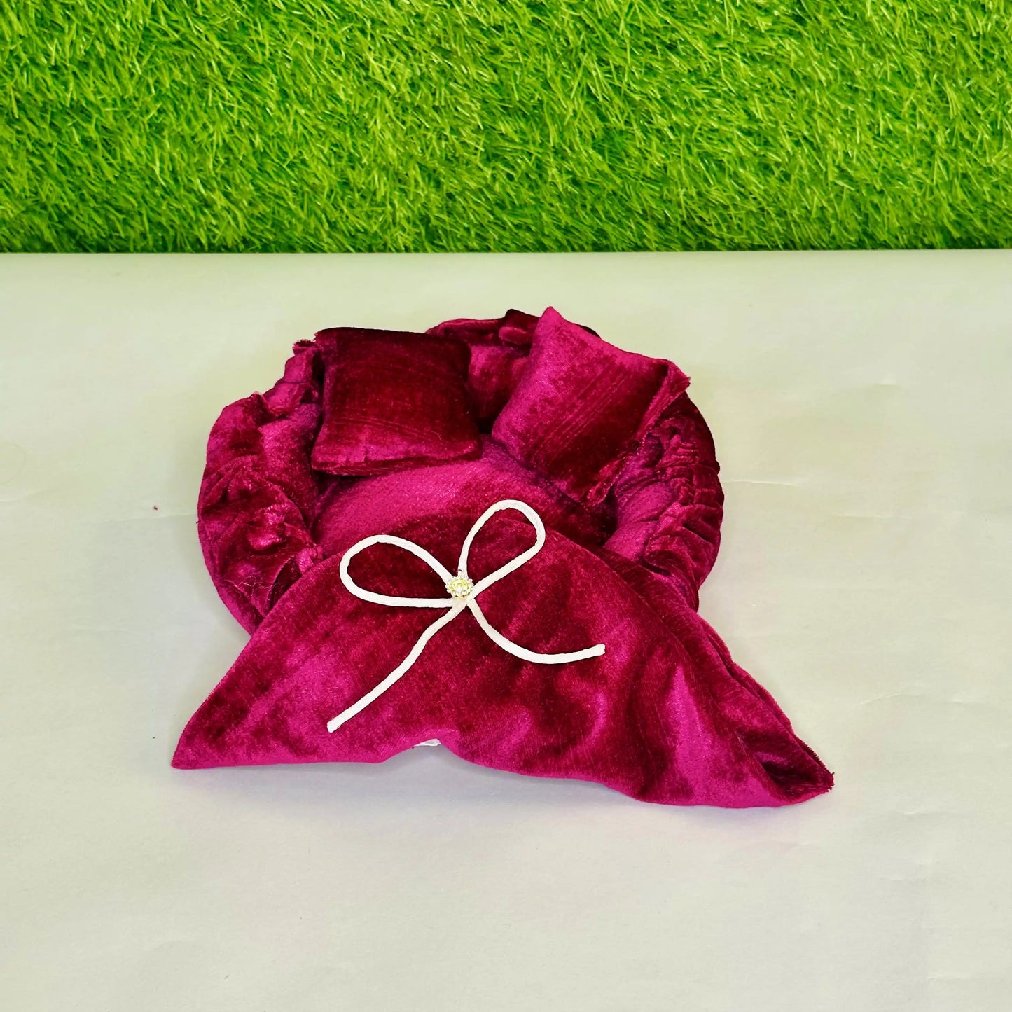 Front view of a Royal Magenta Velvet Laddu Gopal Bedding Set with Designer Bow Blanket & Pillow.