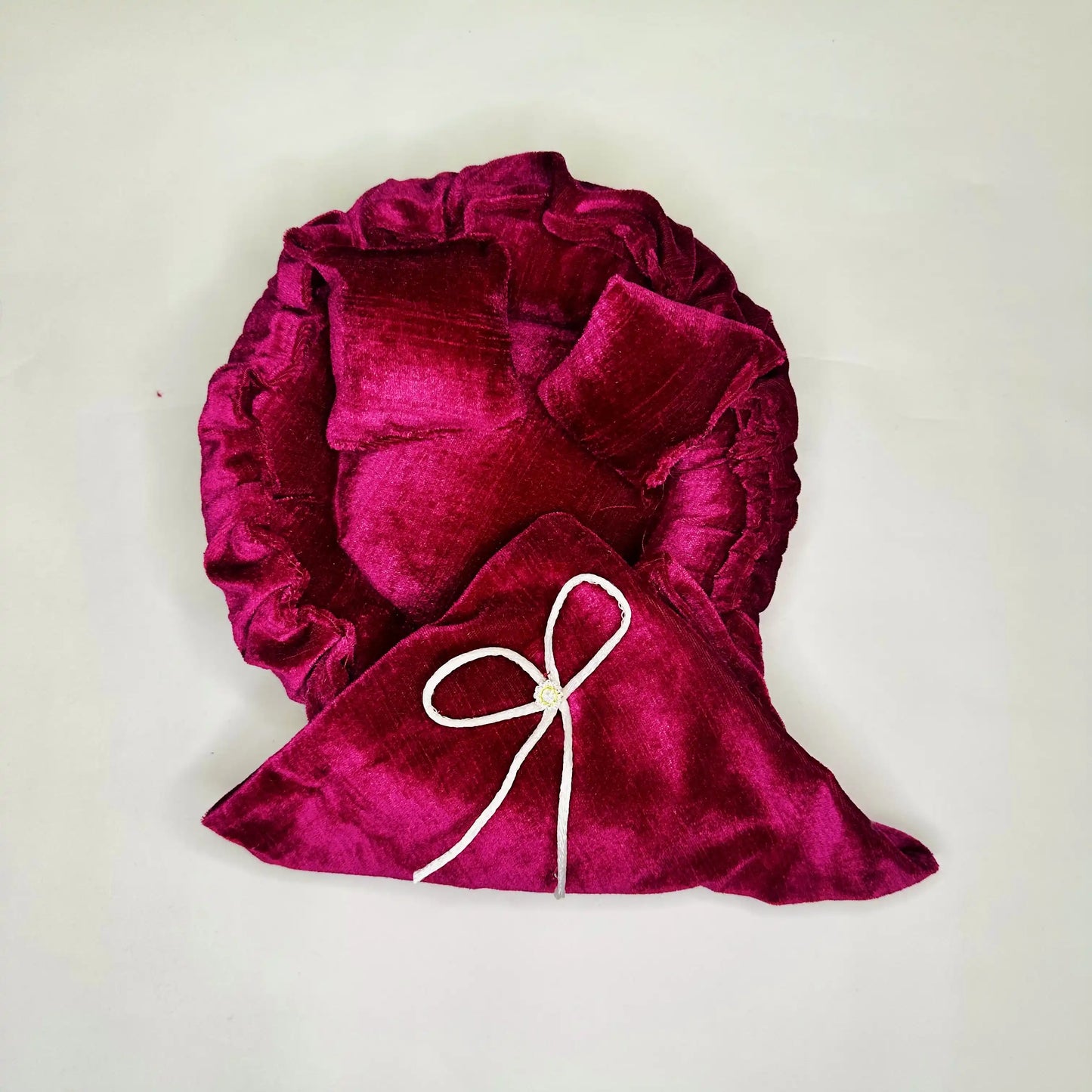 Top view of a Royal Magenta Velvet Laddu Gopal Bedding Set with Designer Bow Blanket & Pillow.