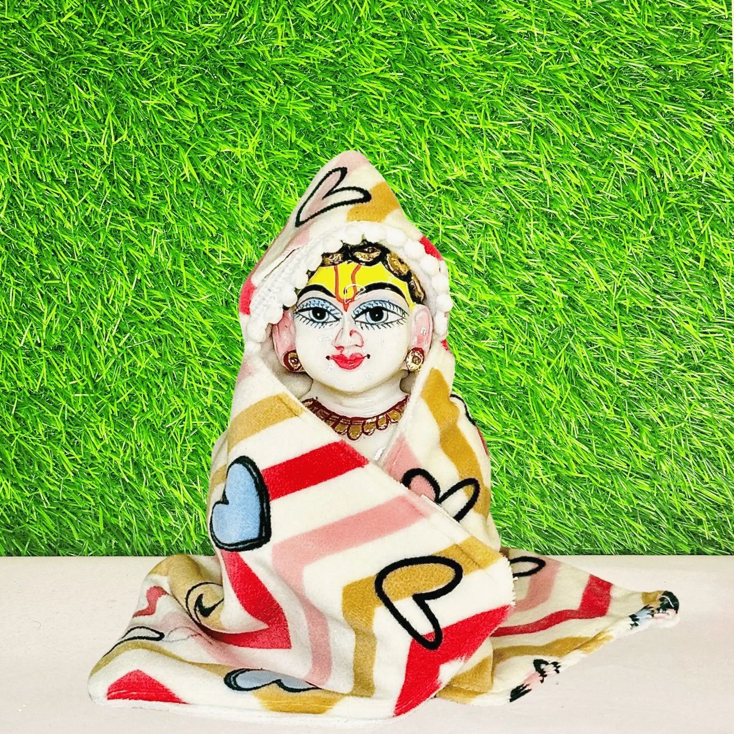 Kanha ji wearing a Shaneel Multicolor Winter Special Laddu Gopal Hoodie Blanket.