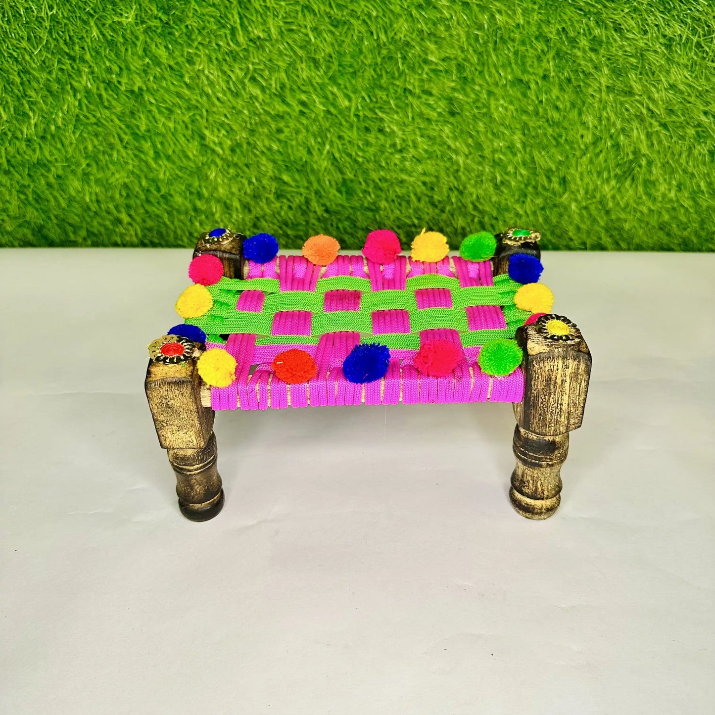 A Traditional Multicolor Pom-Pom Charpai for Laddu Gopal Ji.
