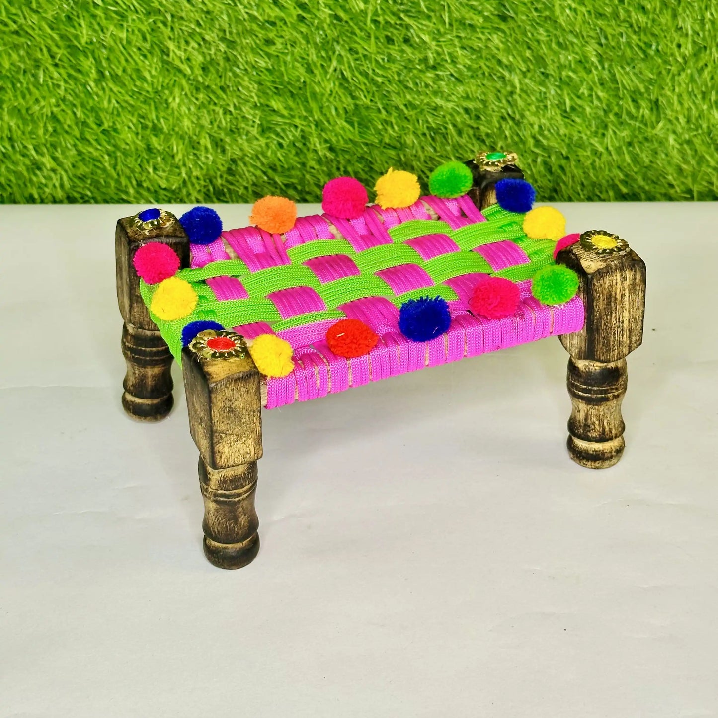 Side Top view of a Traditional Multicolor Pom-Pom Charpai for Laddu Gopal Ji.