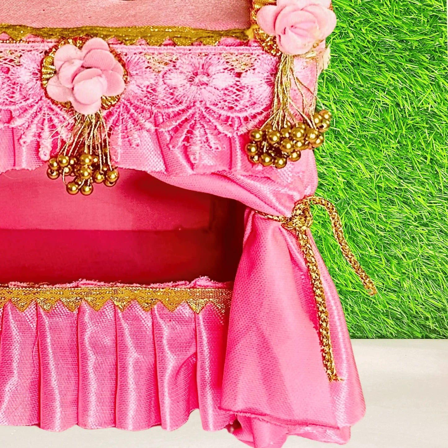 Close view of a Unique Wooden Pink Silk Laddu Gopal Bed cum Singhasan.