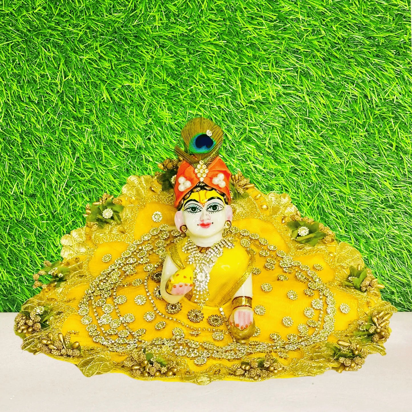 Laddu gopal ji wearing a Yellow Velvet Stone Chain Work Heavy Laddu Gopal Dress.