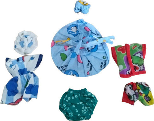 Shyam Diwane baby clothing set including a comb, four laddu toys, a cotton jumpi bib, a night suit, and a neppy cotton dress, size 0-1.